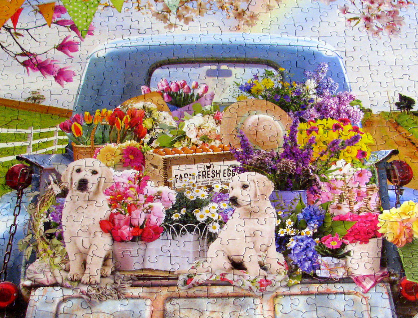 Dogs in the bed of a truck with flowers jigsaw puzzle